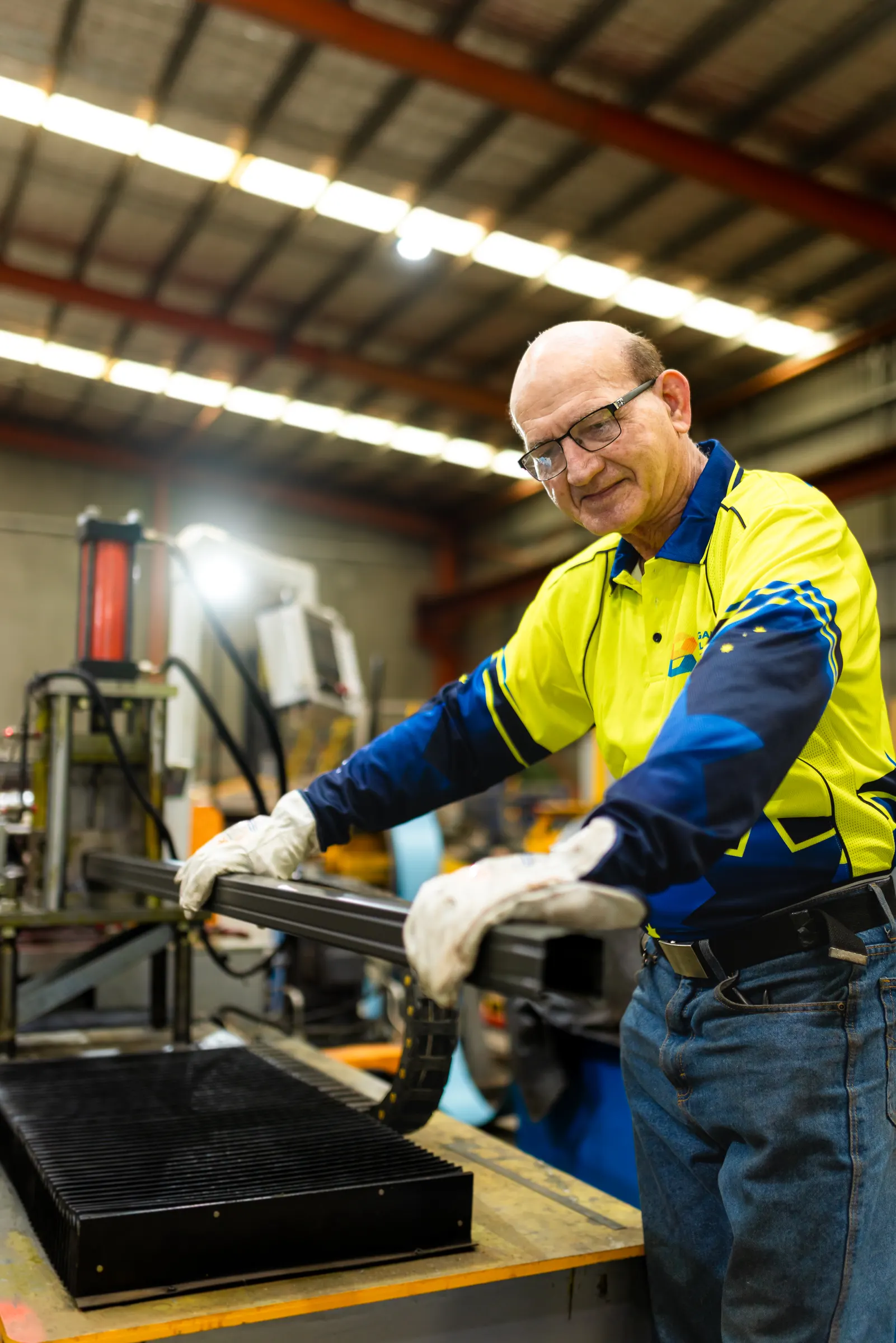 A smiling Bargain Steel Centre team member in the Burton workshop