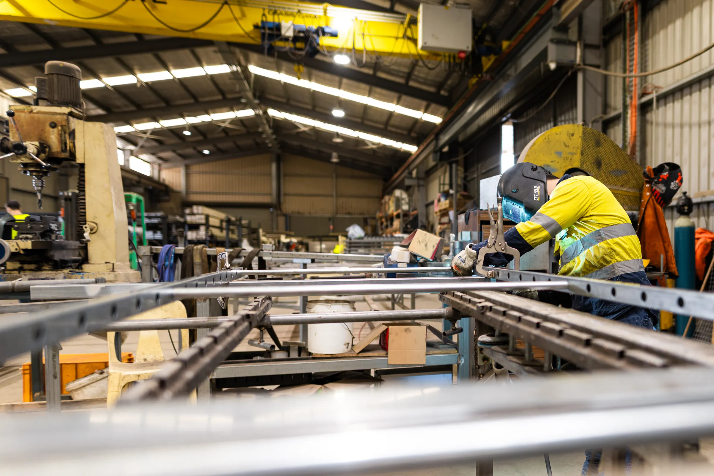 Fabricating steel panels in the workshop