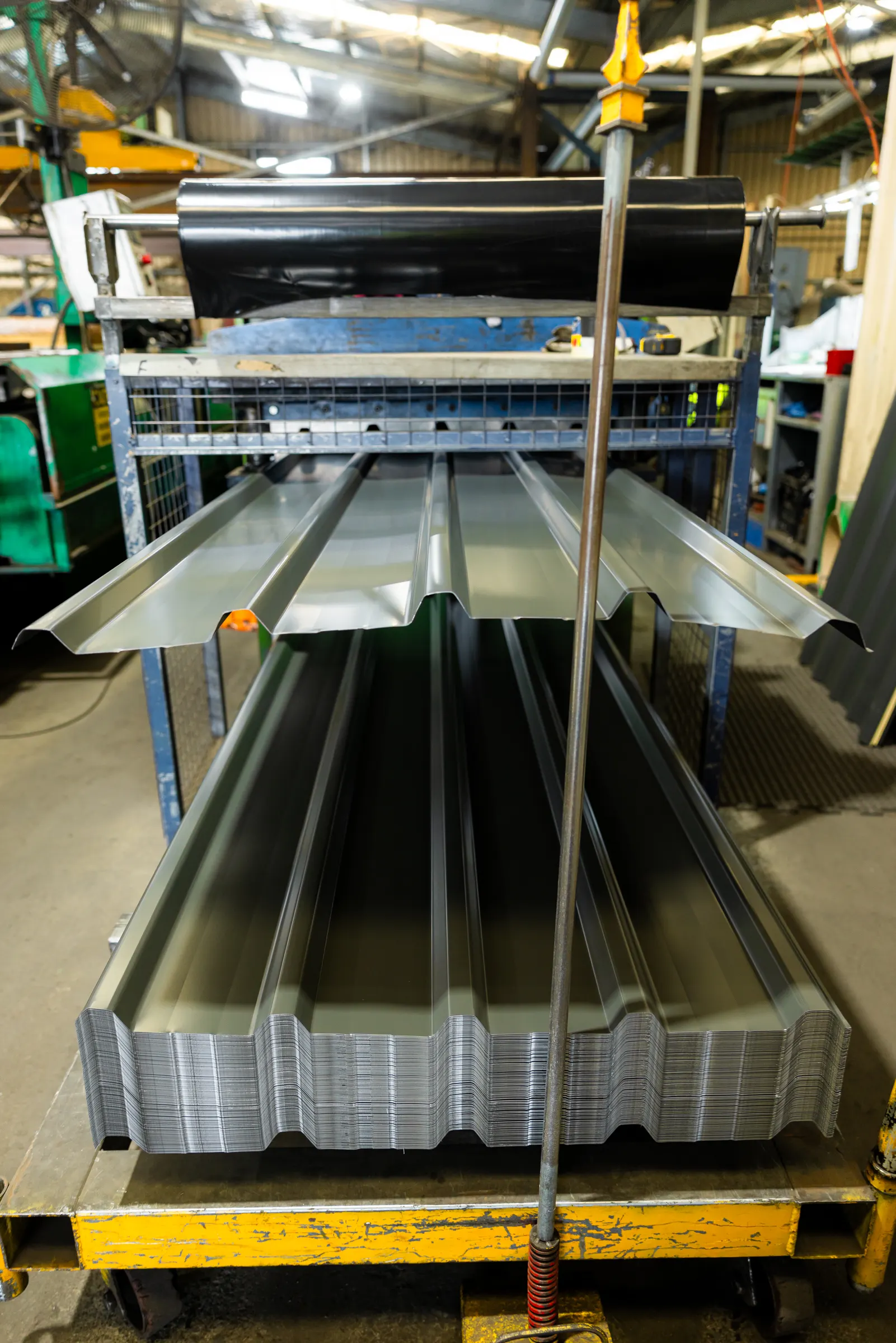 Freshly roll-formed roofing sheets
